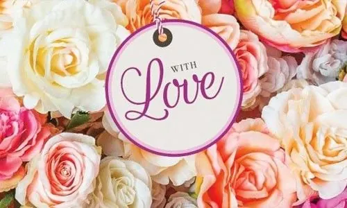 Living Gift roses with a With Love gift label